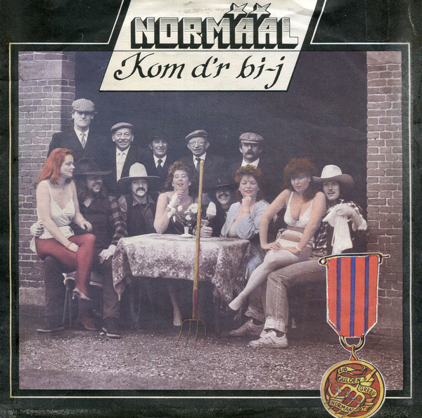 7" | Normaal - Kom d'r Bi-j / Dat is Dat